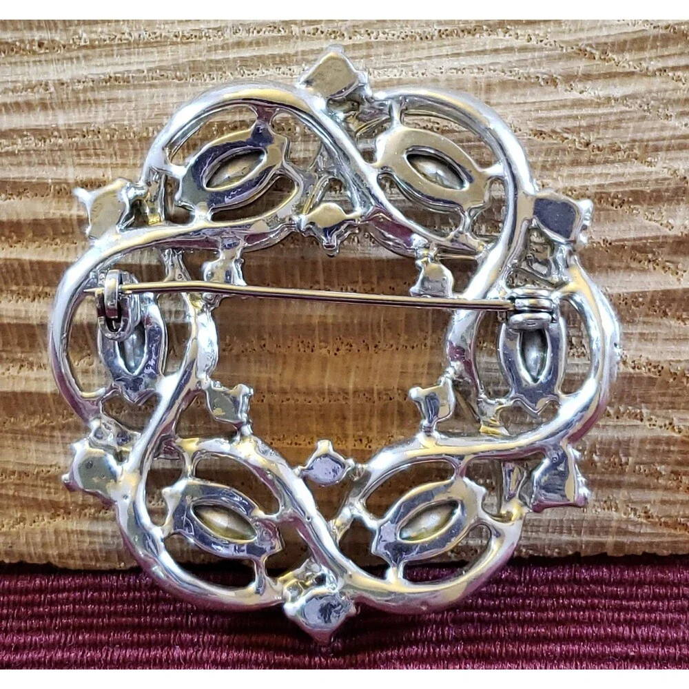 Vintage Unsigned Round Metal Brooch/Pin, Silver Tone Ribbon, Blue Rhinestones
